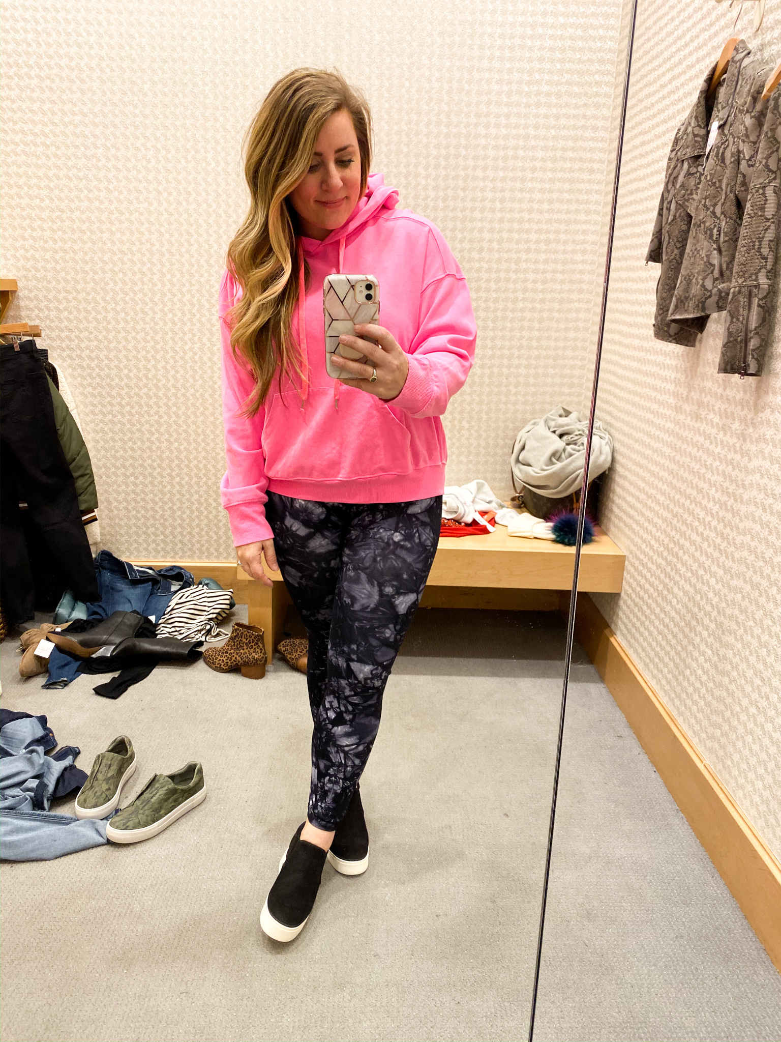 Evereve Outfits by popular Ohio fashion blog, Coffee Beans and Bobby Pins: image of a woman standing in a dressing room and wearing Evereve Free People Good Karma Tie Dye Legging and Evereve J/Slides Sallie Wedge Sneaker.