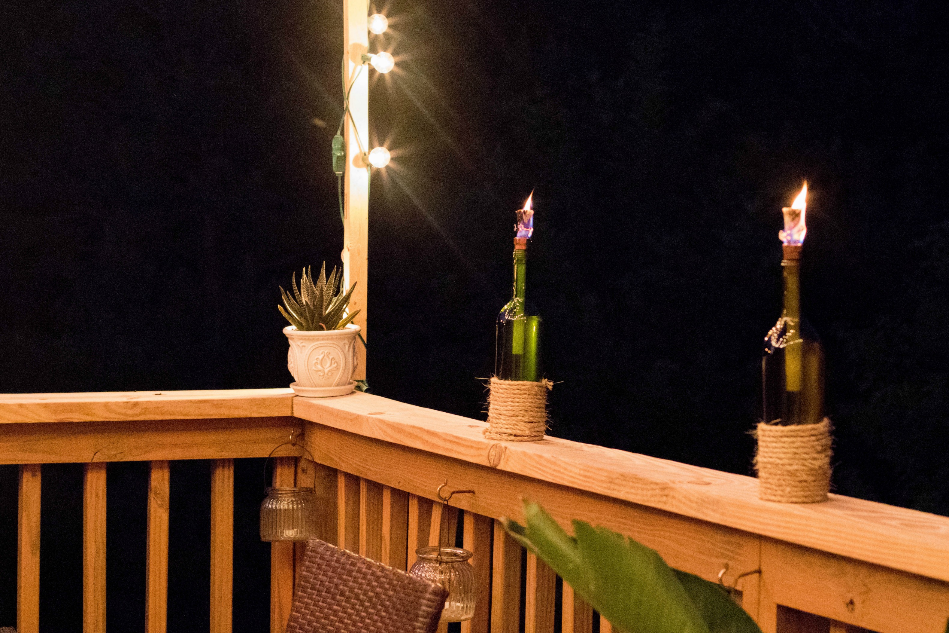 DIY Wine Bottle Tiki Torch by coffee blogger Amy of Coffee Beans and Bobby Pins