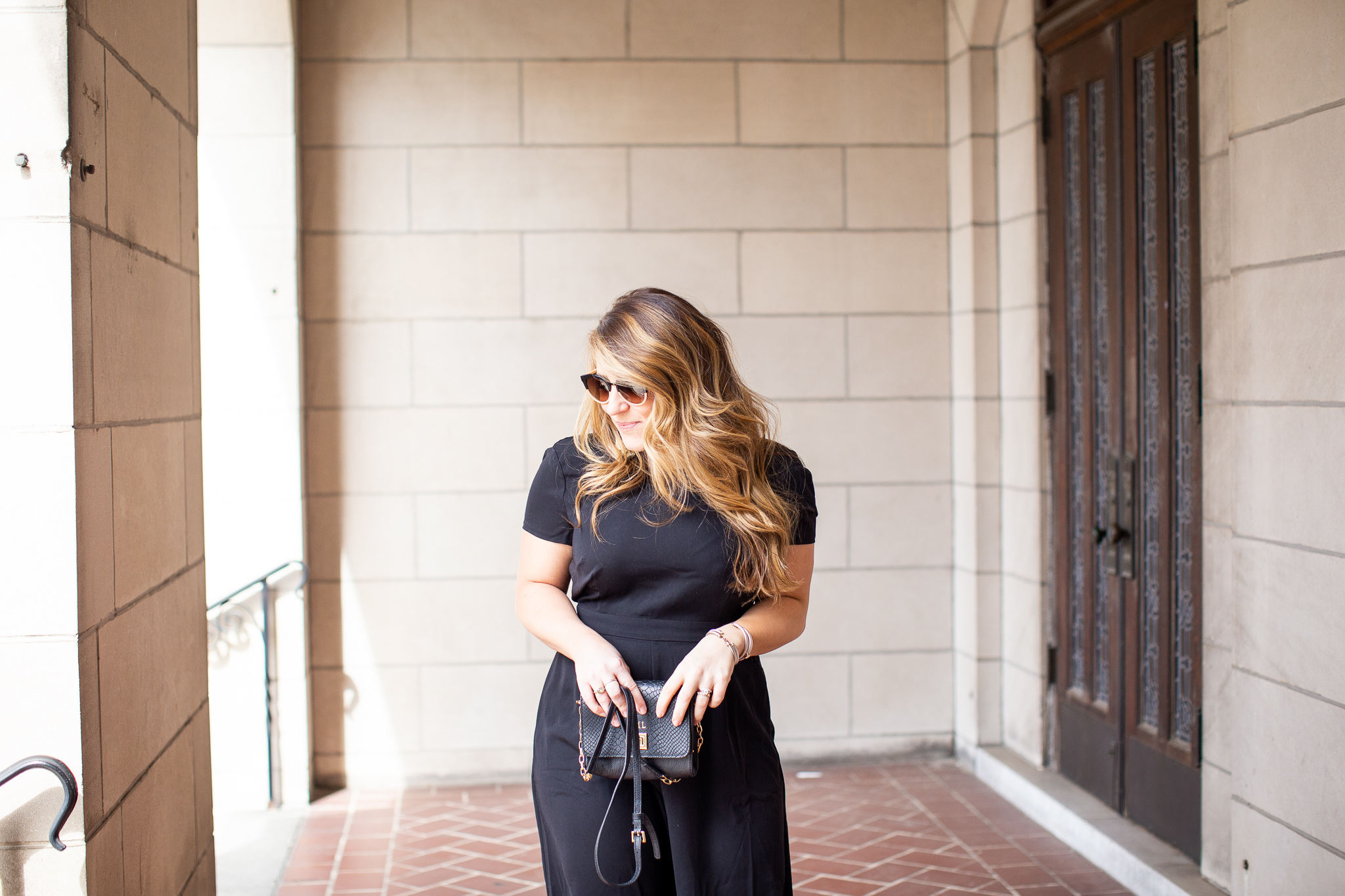 Date Night Black Jumpsuit featured by popular North Carolina Fashion Blogger, Coffee Beans and Bobby Pins