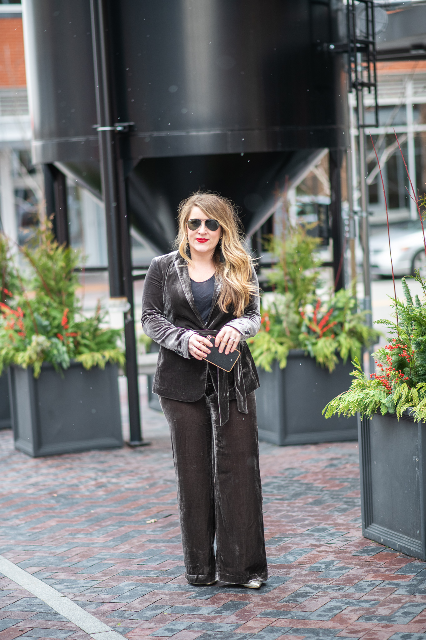 Velvet Pant Suit featured by top US fashion blog Coffee Beans and Bobby Pins; Image of a woman wearing Ann Taylor velvet jacket, Ann Taylor velvet pants, Nordstrom clutch, Nordstrom tank, BCBG shoes and Ray-Ban sunglasses