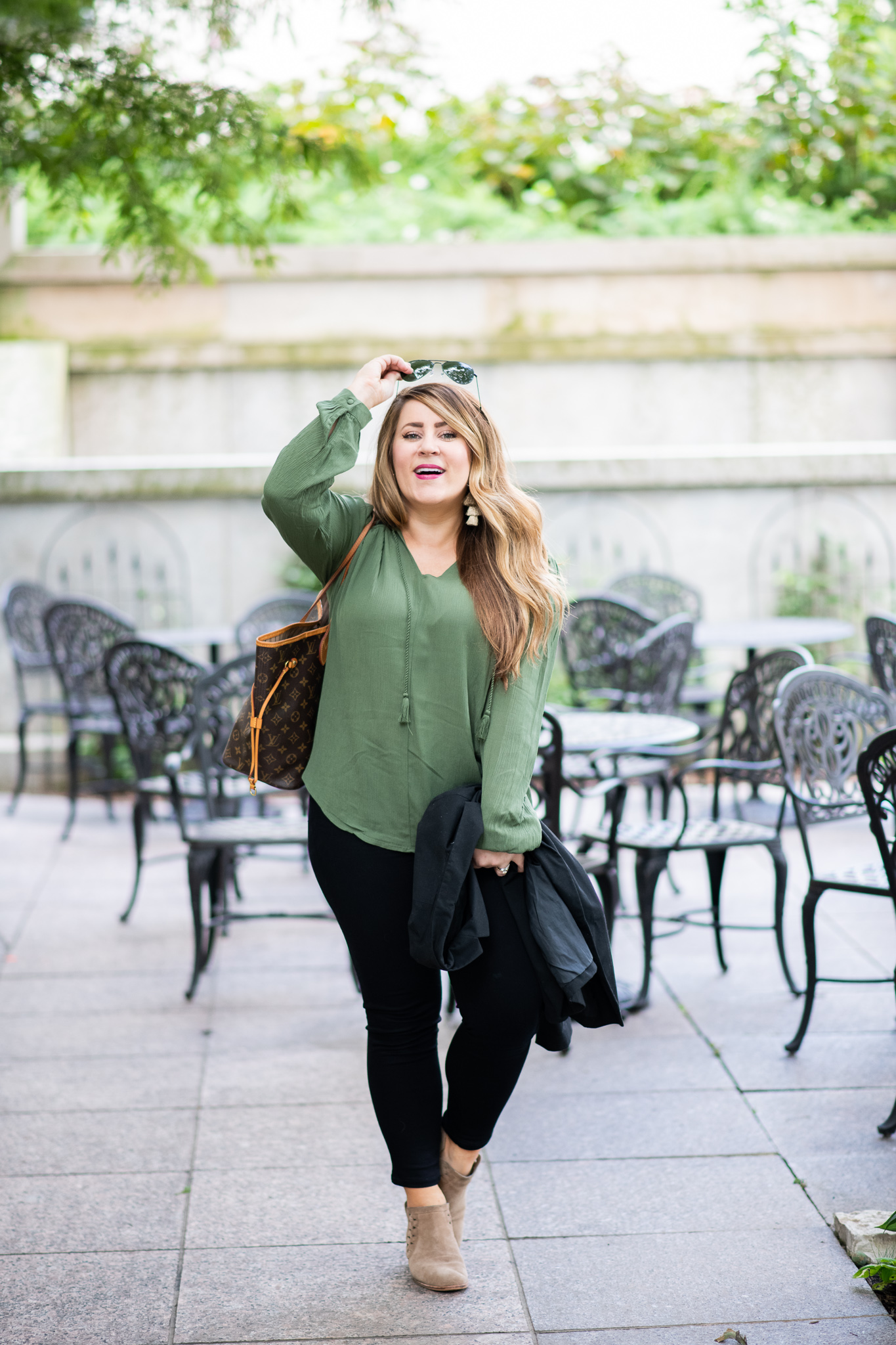 Olive Blouse featured by top US fashion blog Coffee Beans and Bobby Pins; Image of a woman wearing Anthropologie blouse, Nordstrom blazer, Madewell jeans, Vince Camuto booties, Louis Vuitton bag and Madewell earrings.