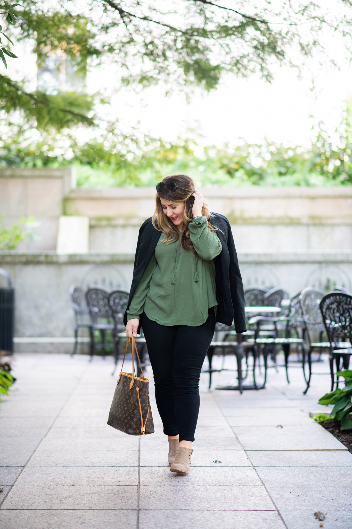 Olive Blouse featured by top US fashion blog Coffee Beans and Bobby Pins; Image of a woman wearing Anthropologie blouse, Nordstrom blazer, Madewell jeans, Vince Camuto booties, Louis Vuitton bag and Madewell earrings.