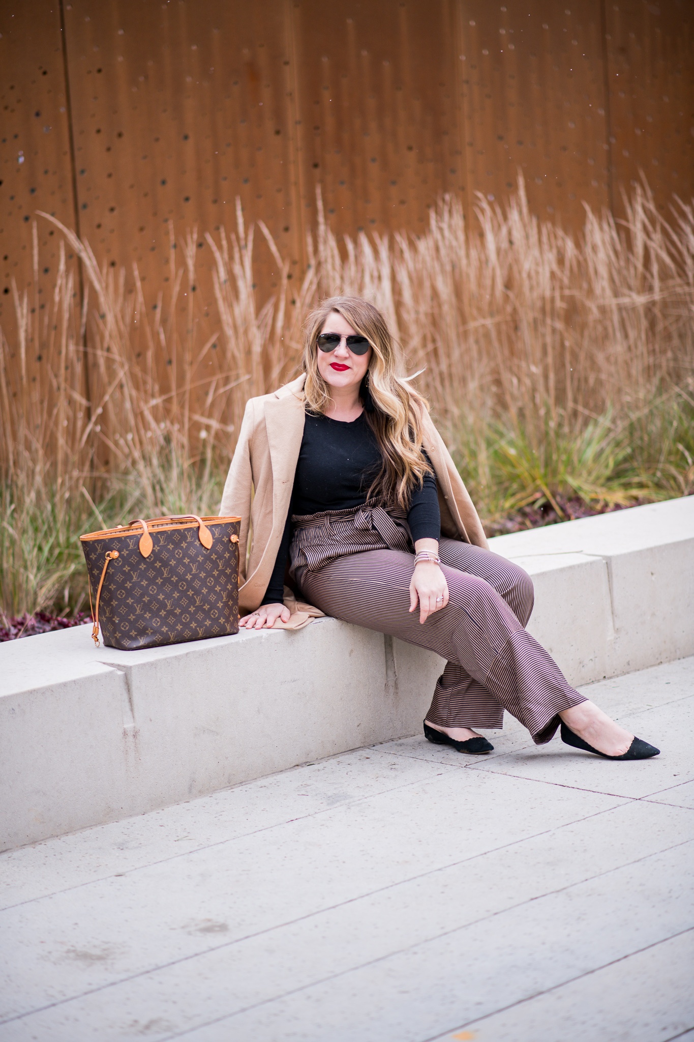 High Waisted Striped Pants featured by top US fashion blog Coffee Beans and Bobby Pins; Image of a woman wearing J.Crew pants, Rothy's shoes, J.Crew sweater, Macy's coat and Ray-Ban sunglasses.