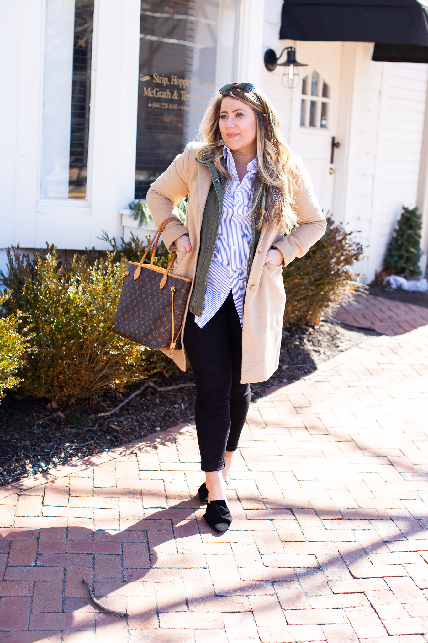 Menswear Fashion Inspired featured by top US fashion blog Coffee Beans and Bobby Pins; Image of a woman wearing J.Crew skinny jeans, J.Crew mules, Gap shirt, Nordstrom jacket and Louis Vuitton bag.