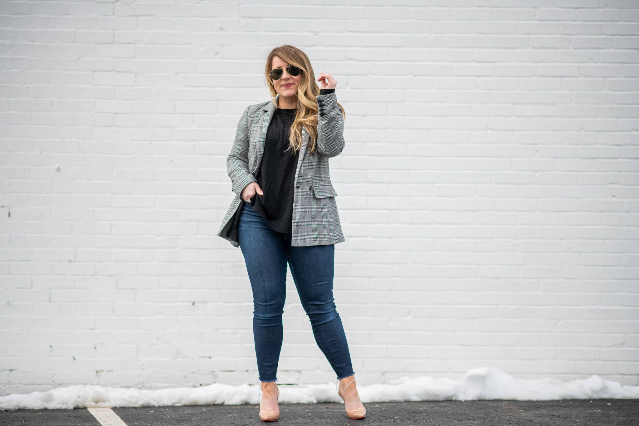 Black and White Plaid Blazer featured by top US fashion blog Coffee Beans and Bobby Pins; Image of a woman wearing J.Crew jeans, Christian Louboutin heels, Gap blazer and Express sweater.