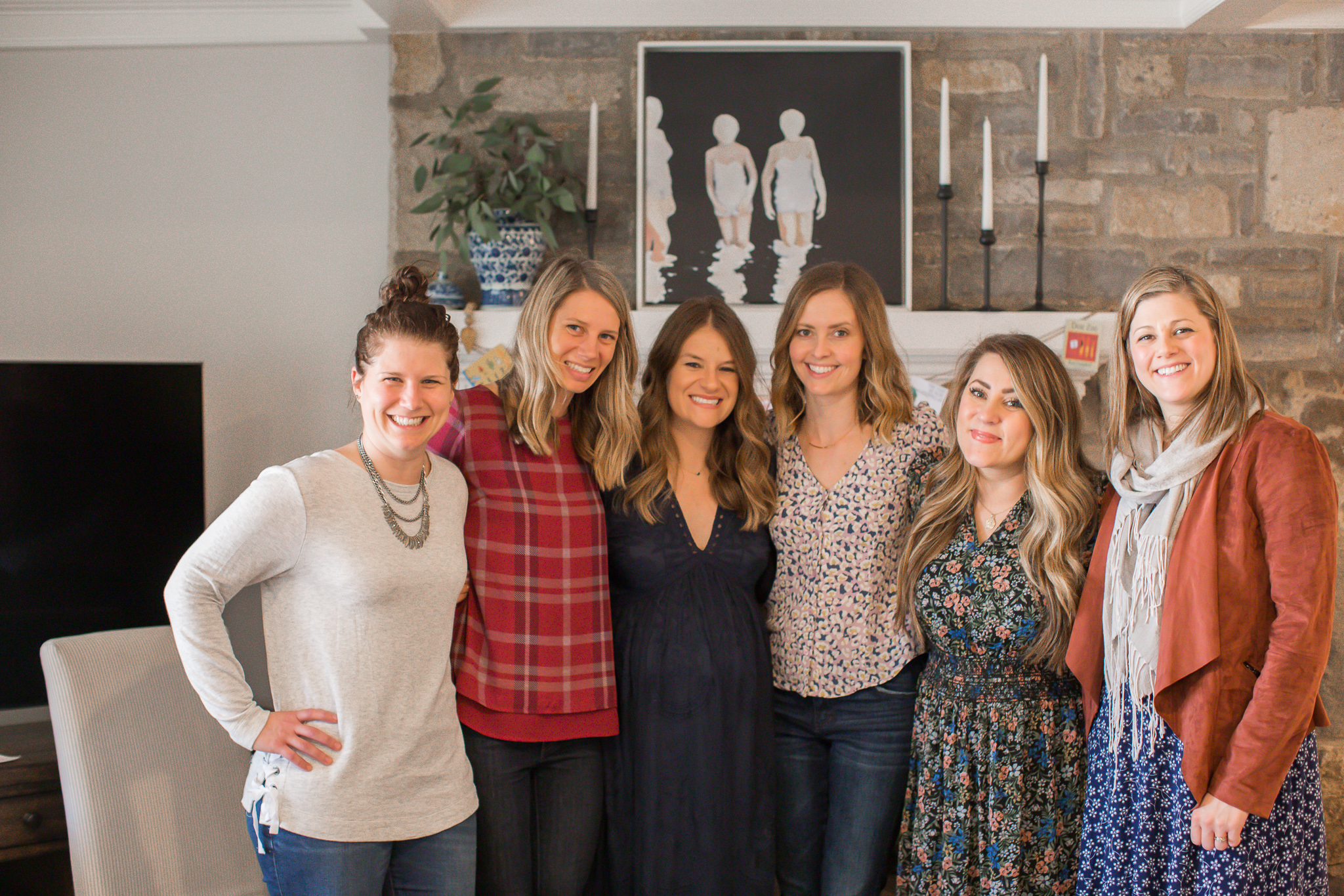  Story Book Baby Shower Ideas by popular North Carolina life and style blog, Coffee Beans and Bobby Pins: image of a group of women standing together.