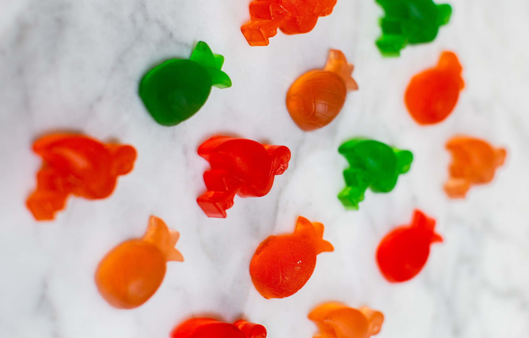 Homemade Vodka Gummy Bears Recipe by popular North Carolina lifestyle blog, Coffee Beans and Bobby Pins: image of various vodka gummy bears.