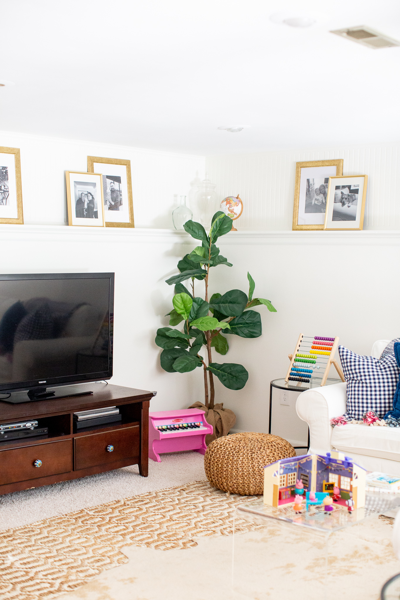 Playroom Storage Ideas and How I Combat All the Toys by popular North Carolina lifestyle blog, Coffee Beans and Bobby Pins: image of a playroom.