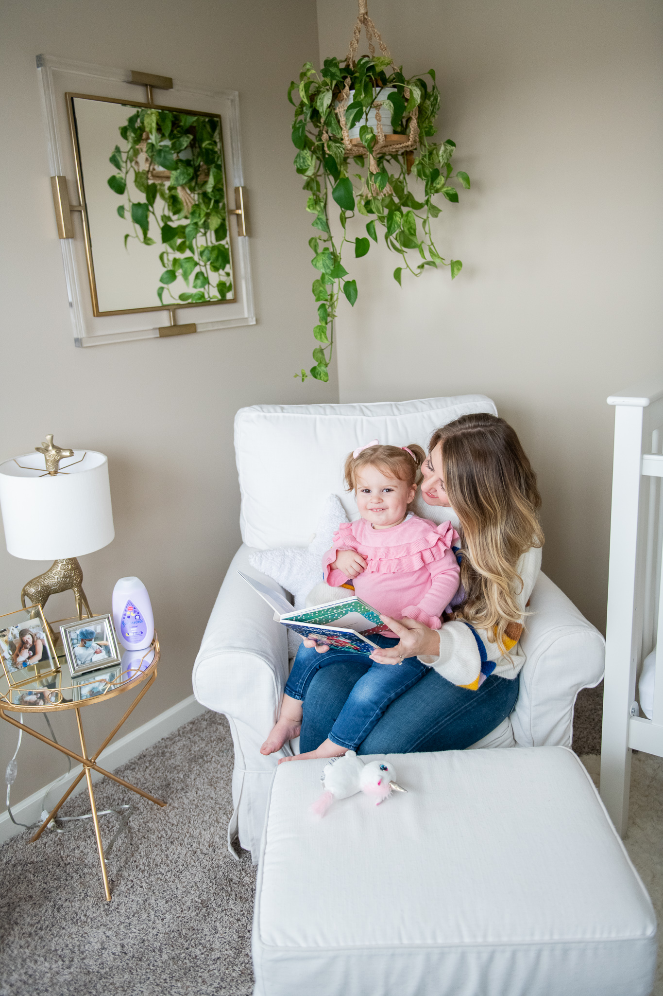 What's in Poppy's Medicine Cabinet by popular North Carolina life and style blog, Coffee Beans and Bobby Pins: image of a mom and daughter reading a book. 