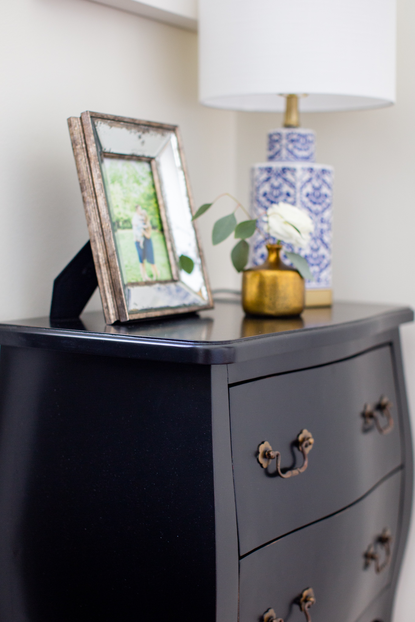 Arhaus Lighting by popular Ohio life and style blog, Coffee Beans and Bobby Pins: image of a entry way decorated with a  Arhaus bombay small chest, and Arhaus lotus bud vase.