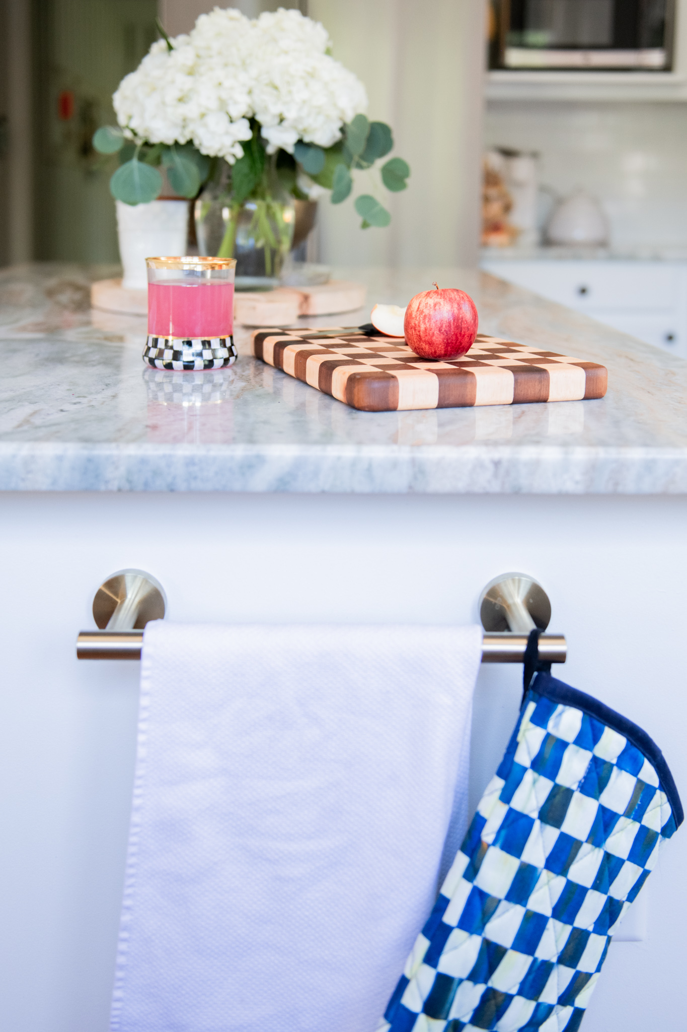 Mackenzie-Childs by popular Ohio life and style blog, Coffee Beans and Bobby Pins: image of Mackenzie-Childs Courtly cutting board and Mackenzie-Childs Royal Check Bistro Oven Mitt.