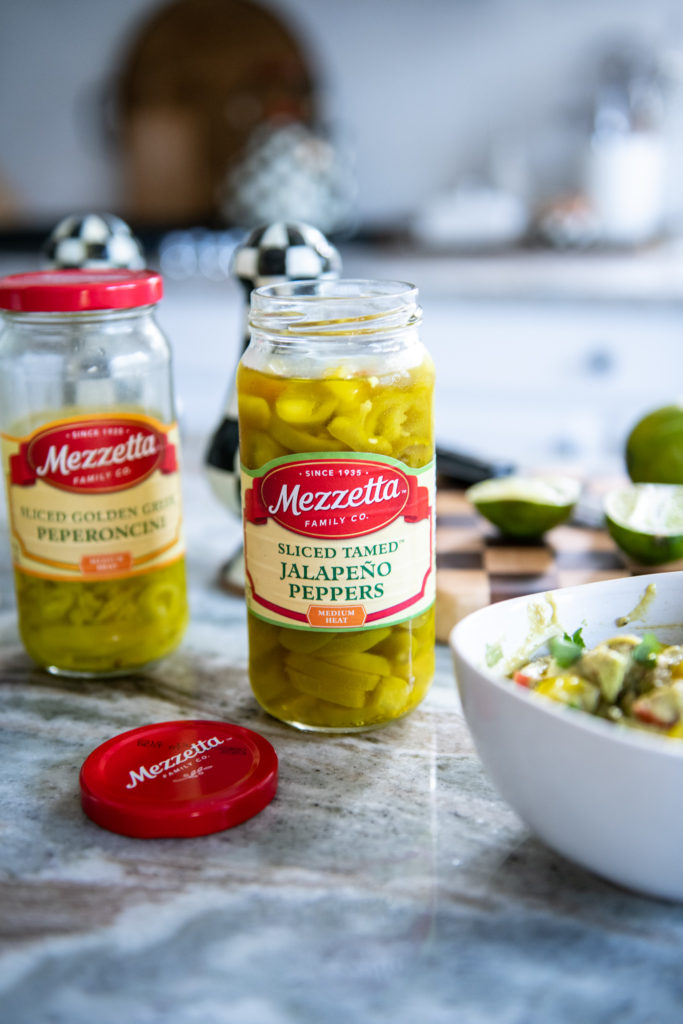 Easy Guacamole Recipe by popular Ohio lifestyle blog, Coffee Beans and Bobby Pins: image of Mezzetta jalapeno peppers. 