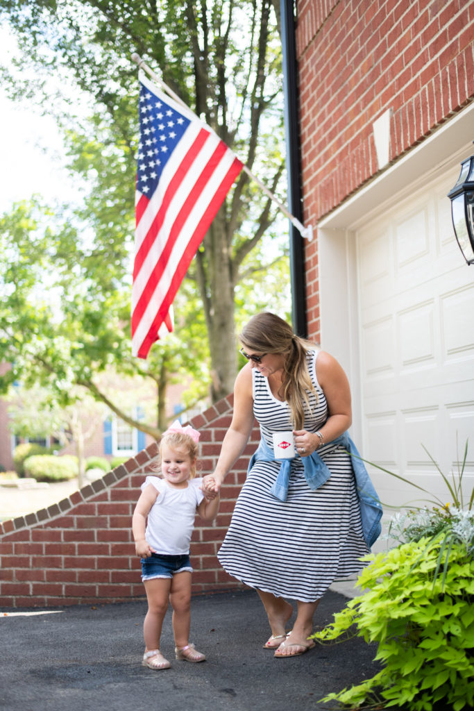 Deep Clean by popular Ohio lifestyle blog, Coffee Beans and Bobby Pins: image of a mom and daughter standing together on their driveway. 