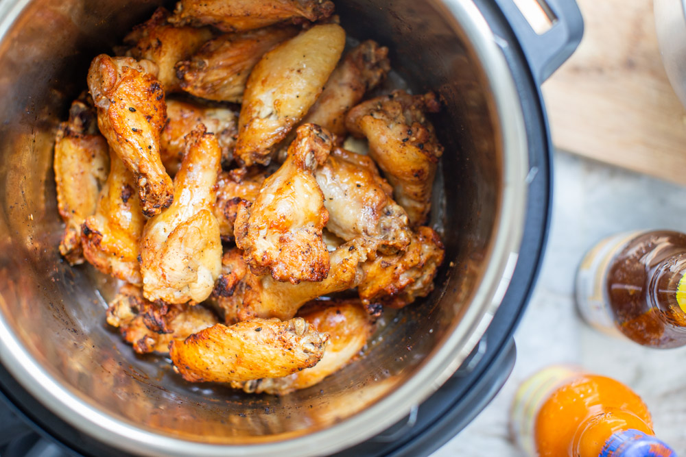 Air Fried Chicken Wings by popular Ohio lifestyle blog, Coffee Beans and Bobby Pins: image of chicken wings in a Insta Pot. 
